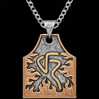 A cow tag necklace featuring a copper flames frame and bronze custom ranch brand 